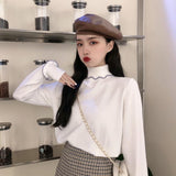 タートルネックメローニット