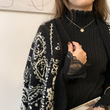 重ね着風ニットトップス