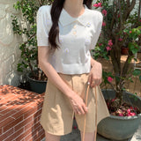 フラワーポロシャツ