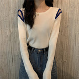 ショルダーカットバイカラートップス