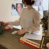 バックリボンバブルスリーブブラウス