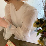 バックリボンバブルスリーブブラウス