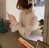 バックリボンバブルスリーブブラウス