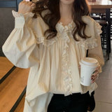 オーバーフリルブラウス