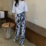 柄ストレートプリーツパンツ