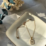 スクエアアルファベットペンダント