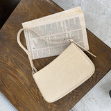 押し型ショルダーバッグ