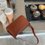 押し型ショルダーバッグ