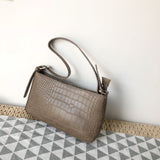 押し型ショルダーバッグ