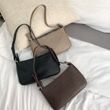 押し型ショルダーバッグ