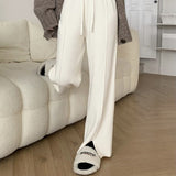 スリット入りセンタープレスリラックスパンツ