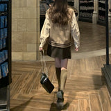 エンブレムニットベスト