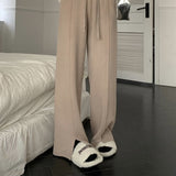 スリット入りセンタープレスリラックスパンツ