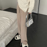 スリット入りセンタープレスリラックスパンツ