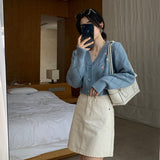 透かし編みフラワーカーディガン