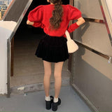 アームウォーマー付きニット