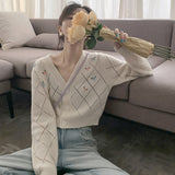 透かし編みフラワーカーディガン