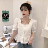 半袖ペプラムトップス