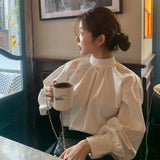 ハイネックギャザーブラウス