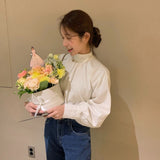 ハイネックギャザーブラウス