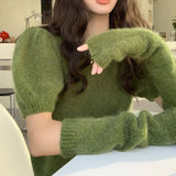 アームウォーマー付きニット